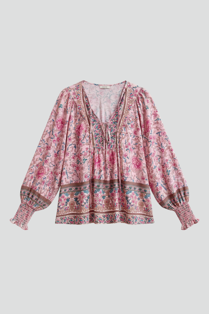 Women's long sleeve floral blouse with V-neck, loose fit. Ideal for casual spring & summer fashion.