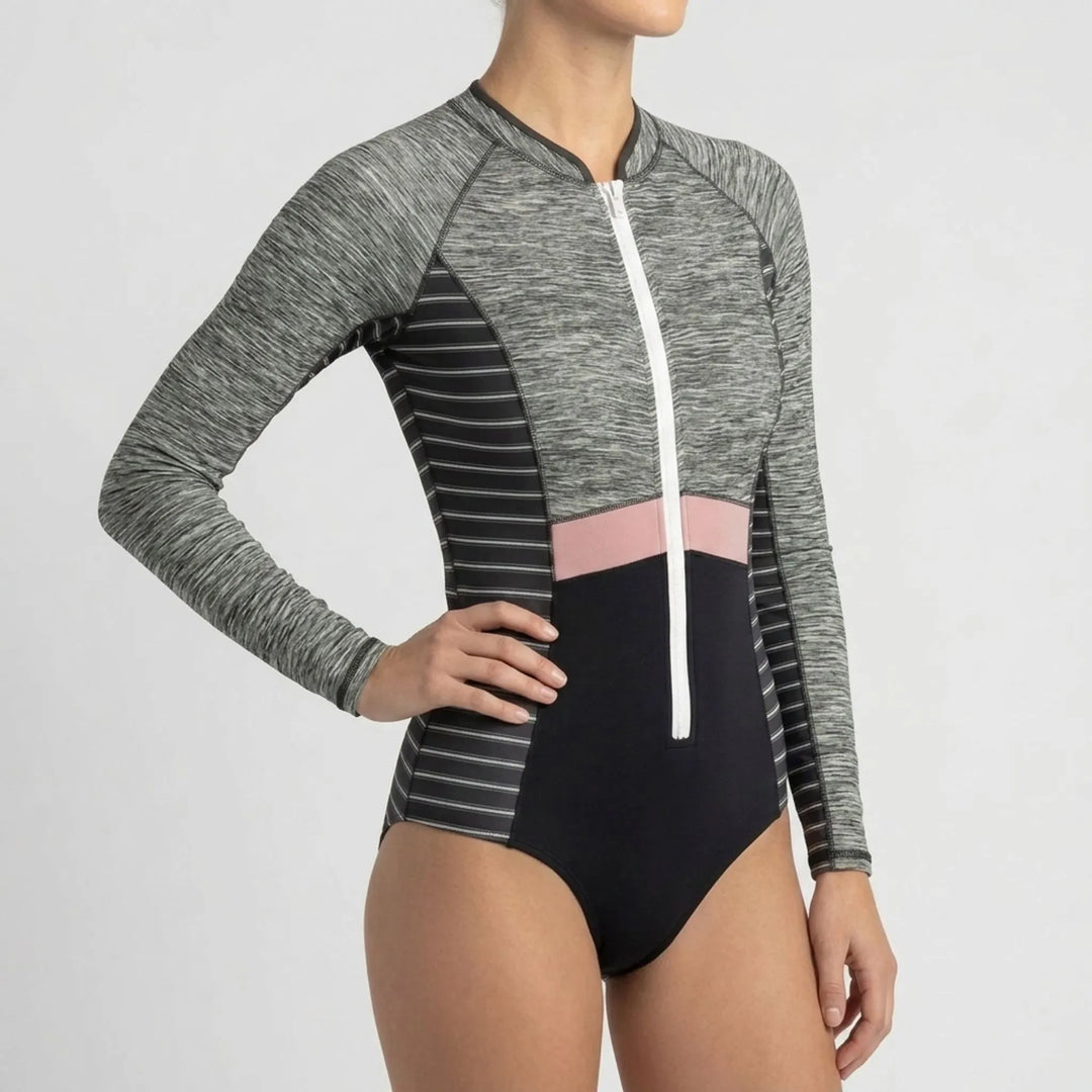 Sporty women's long-sleeve one-piece swimwear with front zipper, perfect for active water sports.