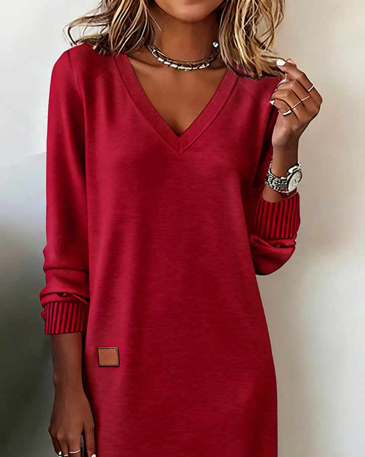 Stunning red long sleeve V-neck midi dress for women, ideal for office and everyday. Versatile & chic.