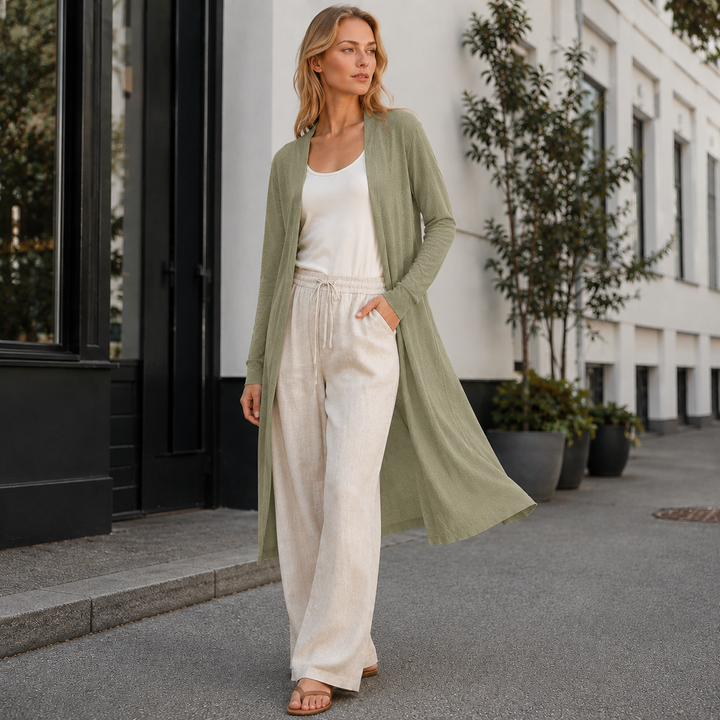 Highly versatile women's long warm knit cardigan for many occasions. Perfect fall & winter layering outerwear.
