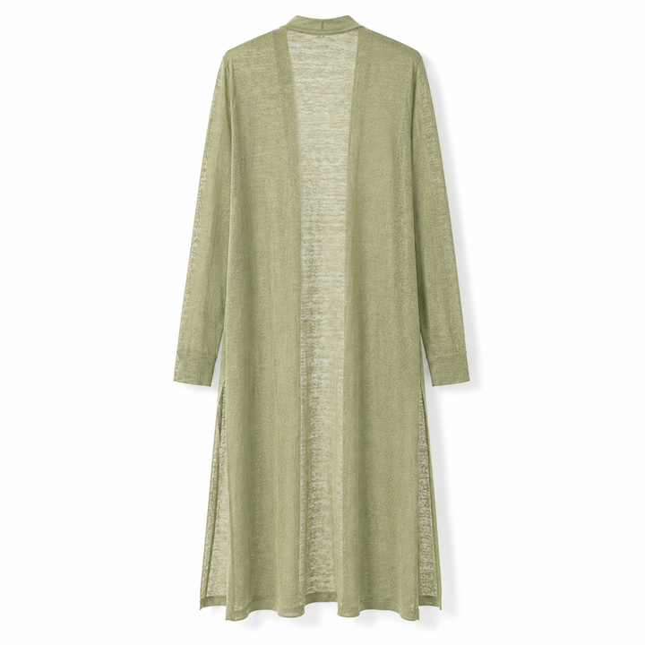 Close-up of the textured knit of a women's long warm cardigan, perfect for cozy and stylish layering.