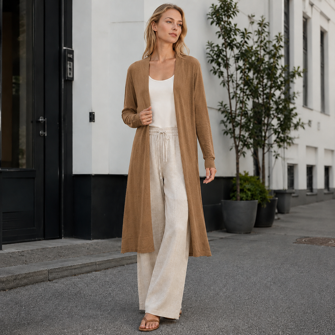 Plush women's long warm cardigan for ultimate coziness. Ideal for chilly fall days & winter evenings.