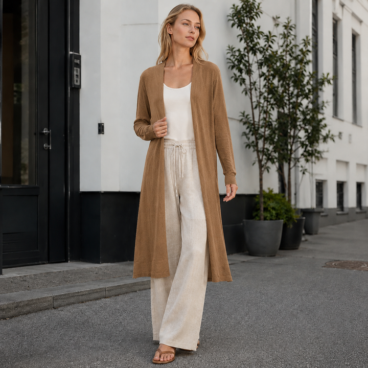 Plush women's long warm cardigan for ultimate coziness. Ideal for chilly fall days & winter evenings.