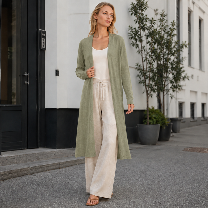 Soft knit women's long cardigan, offering a warm and comfortable layering option for everyday wear.