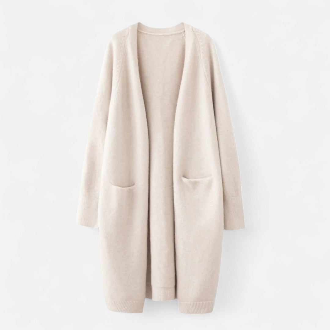 Women's longline open front cardigan coat in a versatile solid color, perfect for elegant layering. Features cozy front pockets.