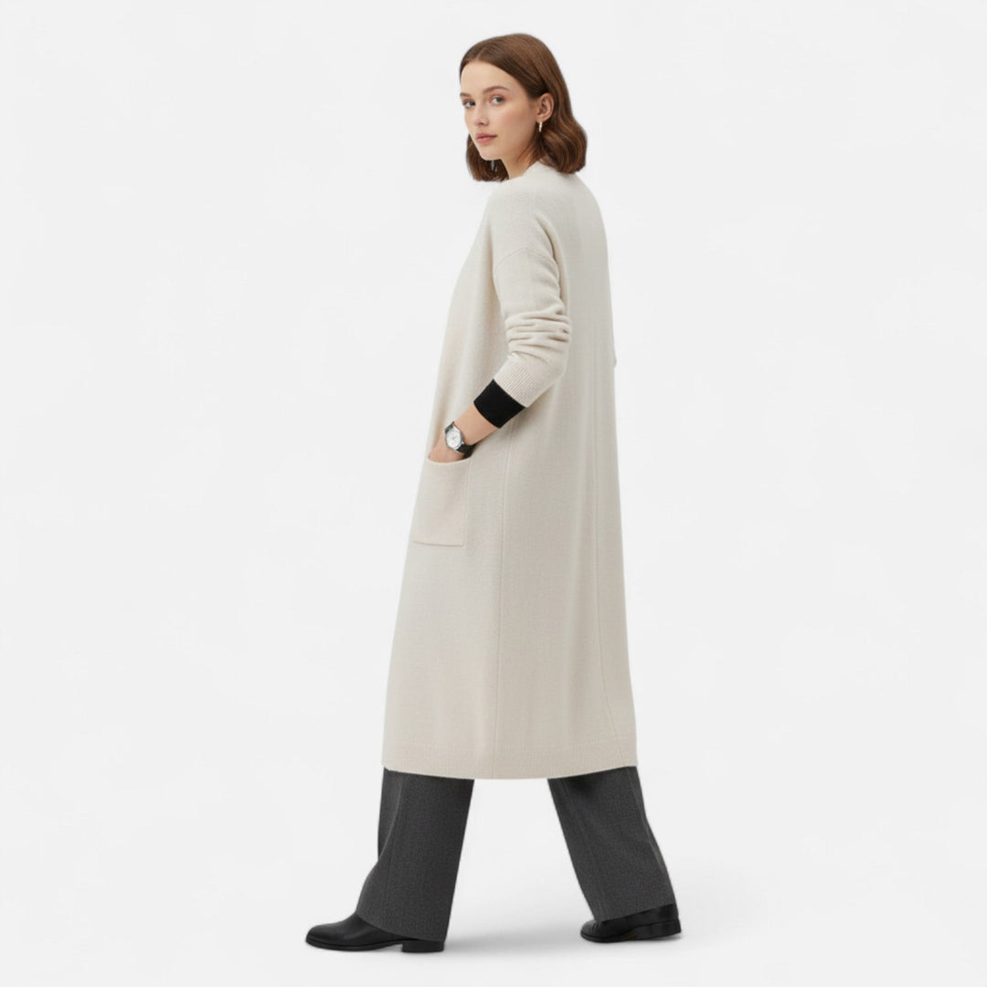 Chic women's open front longline cardigan, ideal for casual or elegant layering. A cozy, must-have fall fashion coat.