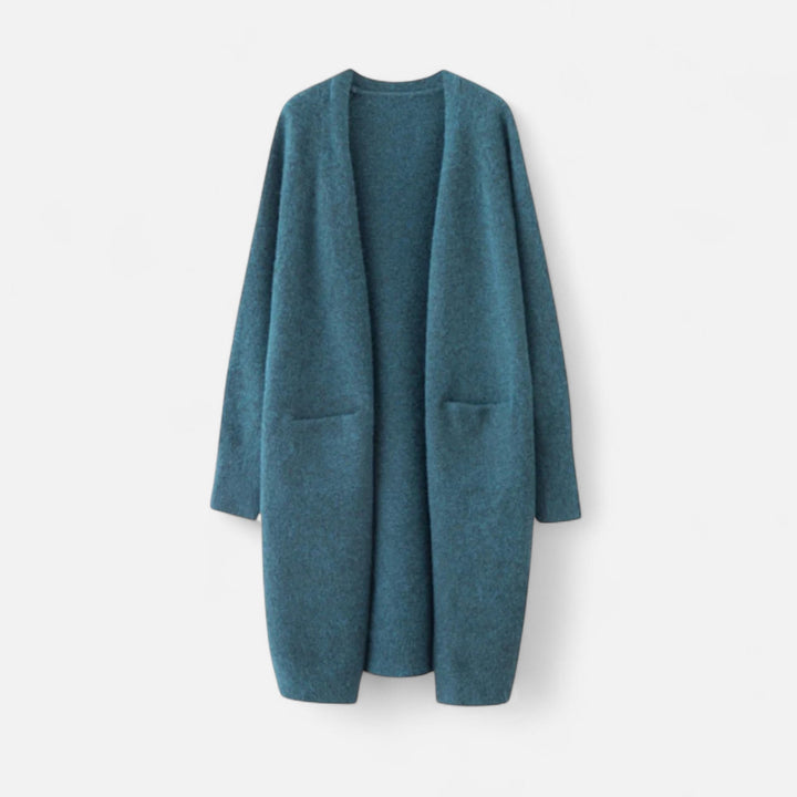 Woman wearing a cozy, longline open front cardigan coat, perfect for stylish fall fashion & comfortable layering.