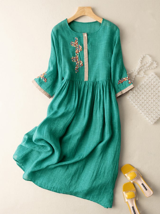 Stylish women's relaxed fit embroidered boho dress, comfortable for summer outings.