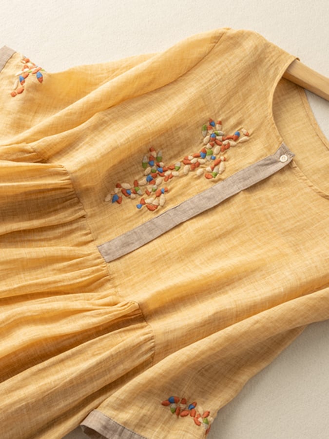 Elegant casual women's boho summer dress, loose fit with intricate embroidery and round neck.