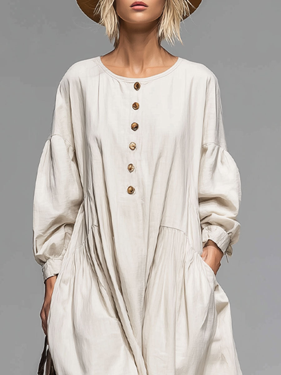 Comfortable women's long sleeve midi dress with stylish button-front design and handy pockets for versatile wear.