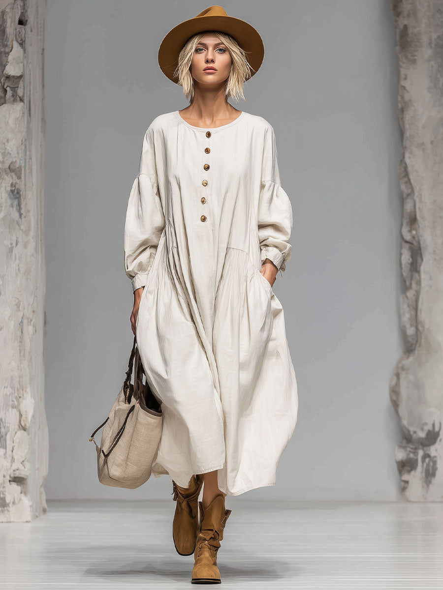Fashionable women's casual midi dress with a button-front detail, loose silhouette, and essential pockets.