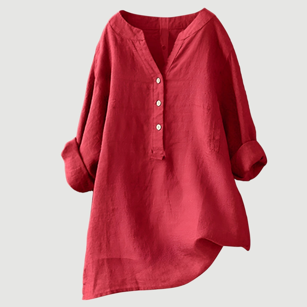 Women's loose fit v-neck blouse with rolled sleeves and button-up front. Versatile casual chic top.