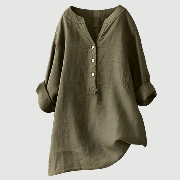 Women's versatile loose fit v-neck blouse with rolled sleeves. A chic button-up top for spring & summer.