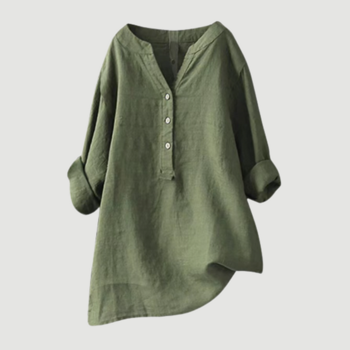 Elegant women's loose fit blouse, perfect for spring/summer outfits. Features v-neck and rolled sleeves.