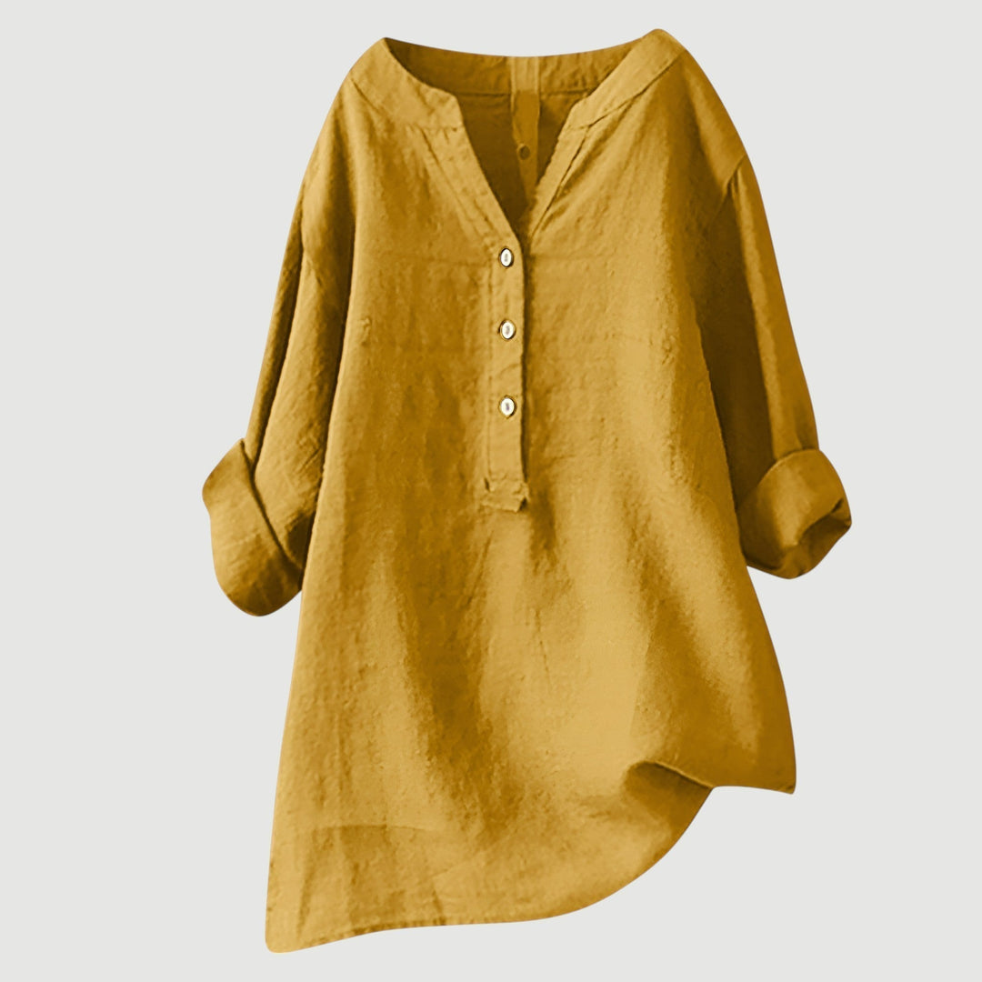 Flowy loose fit women's v-neck blouse with rolled sleeves. A stylish button-up top for versatile fashion.