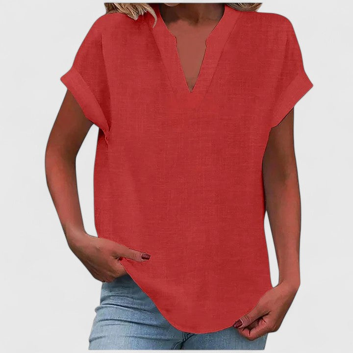 Bright women's loose fit V-neck blouse, casual cap sleeve top for versatile everyday fashion.