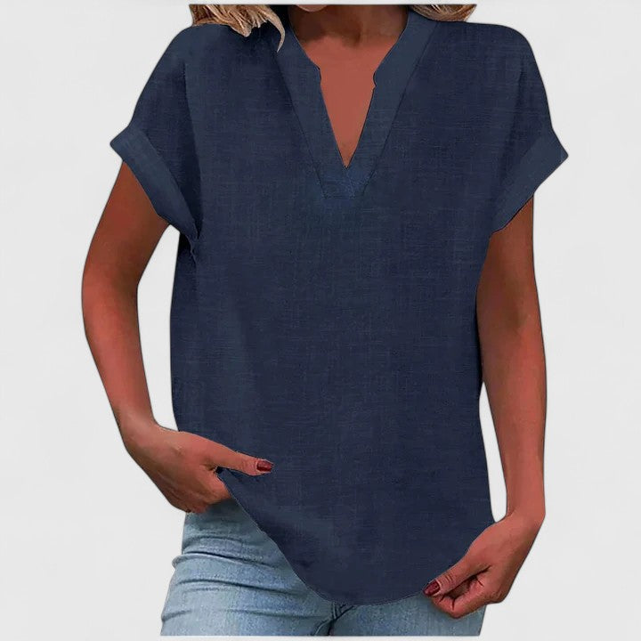 Spring fashion women's V-neck blouse, loose fit and cap sleeves for a comfortable summer top.