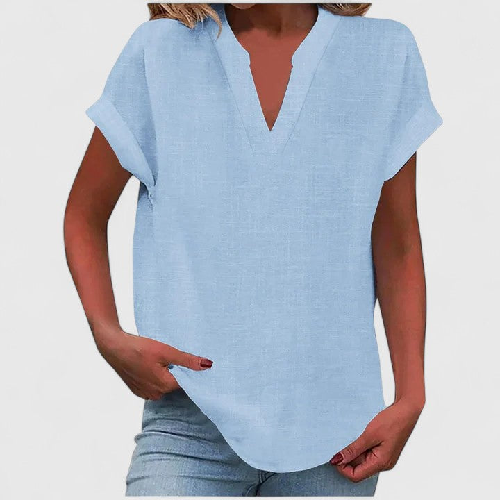 Relaxed women's casual top, V-neck, loose fit, cap sleeves, comfortable for spring/summer days.