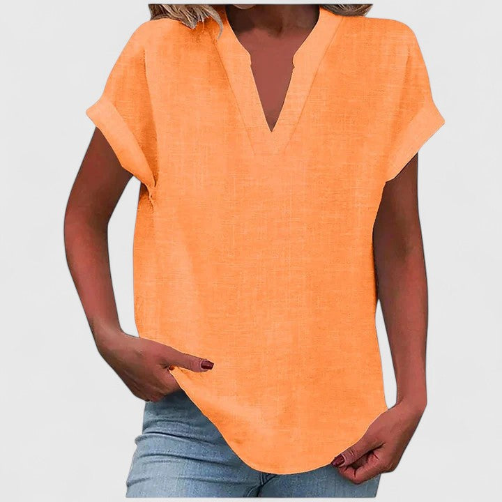 Everyday essential: women's V-neck loose fit blouse, comfortable cap sleeve top for versatile styling.