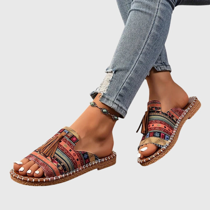 Pair of Lorraine women's orthopedic sandals, offering robust arch support, comfort, & foot pain relief. Summer essential.