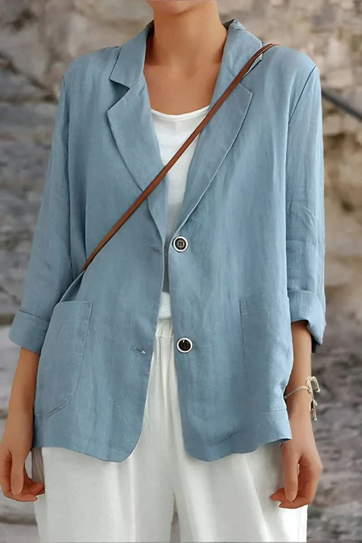 Chic women's open back tailored blazer. Modern jacket design for versatile styling, from office to elegant casual looks.