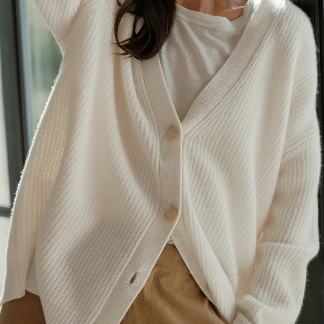Relaxed fit women's oversized cardigan, a soft knit luxury sweater for elegant casual wear.