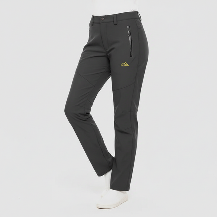 Feminine women's Lydia winter pants, waterproof & insulated, perfect for snowy hiking.