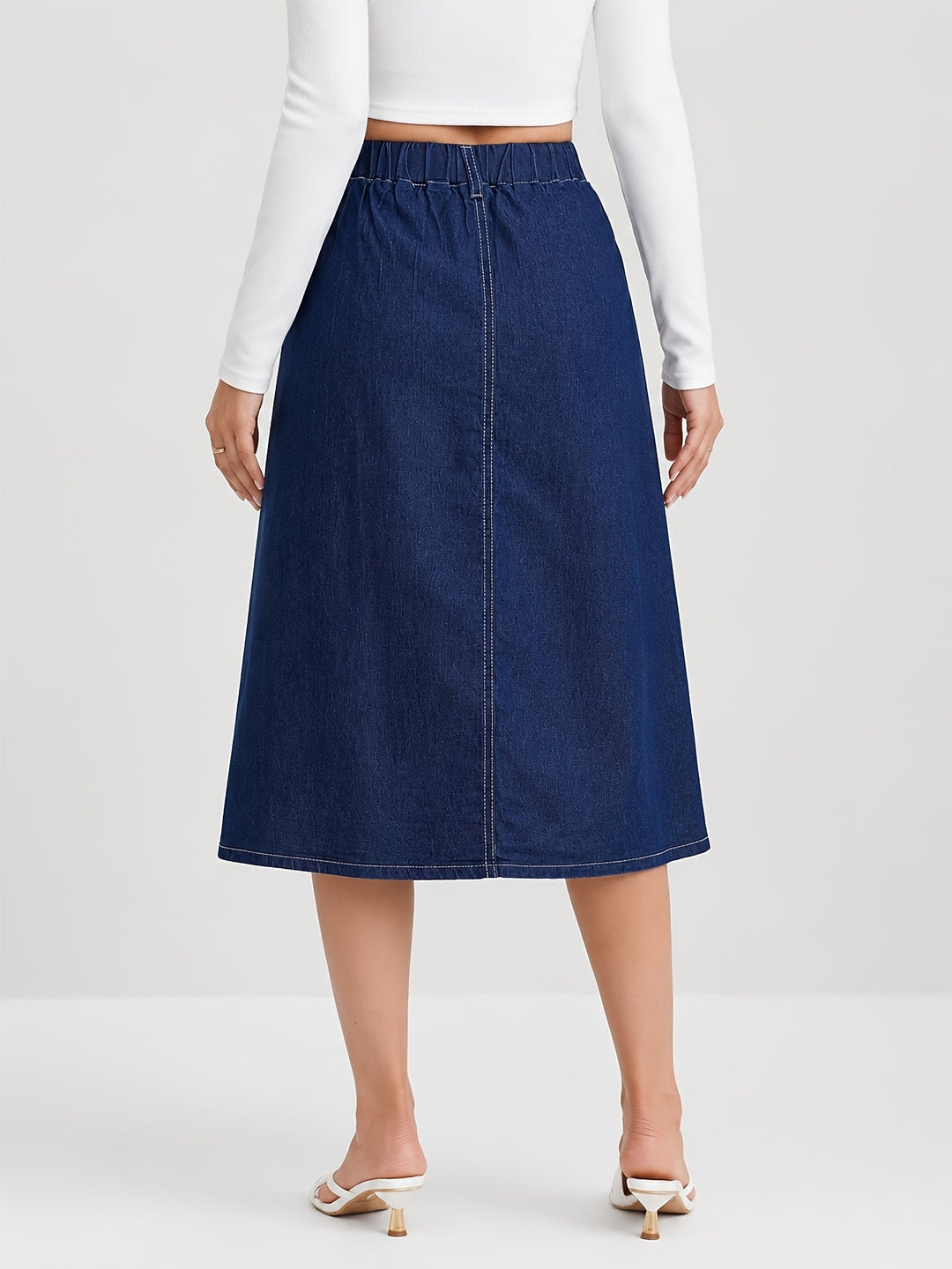 Versatile women's midi skirt in medium blue. A-line shape with button front closure, great for casual & classic looks.