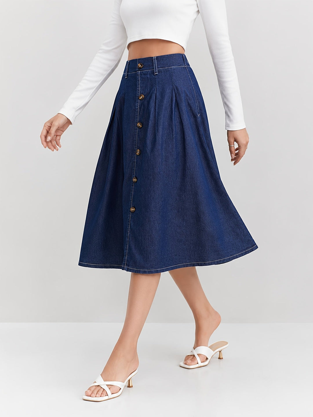 Classic medium blue A-line midi skirt for women. Button front detail makes it a stylish piece for everyday wear.