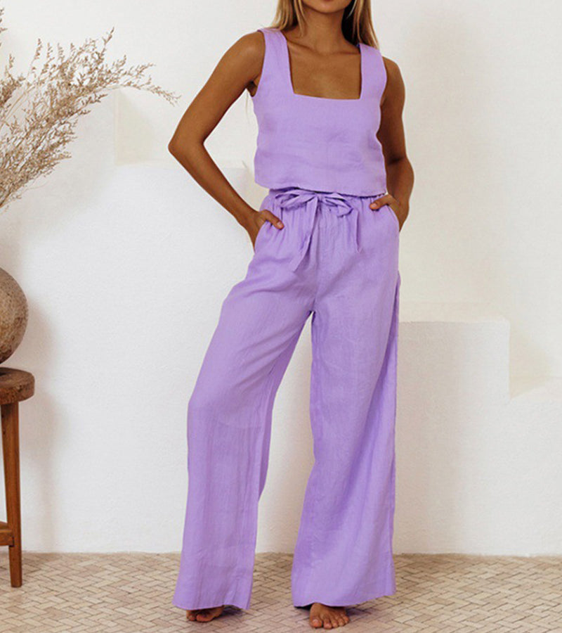 Versatile women's matching set: elegant minimalist top & wide-leg pants, perfect for casual or dressed up.