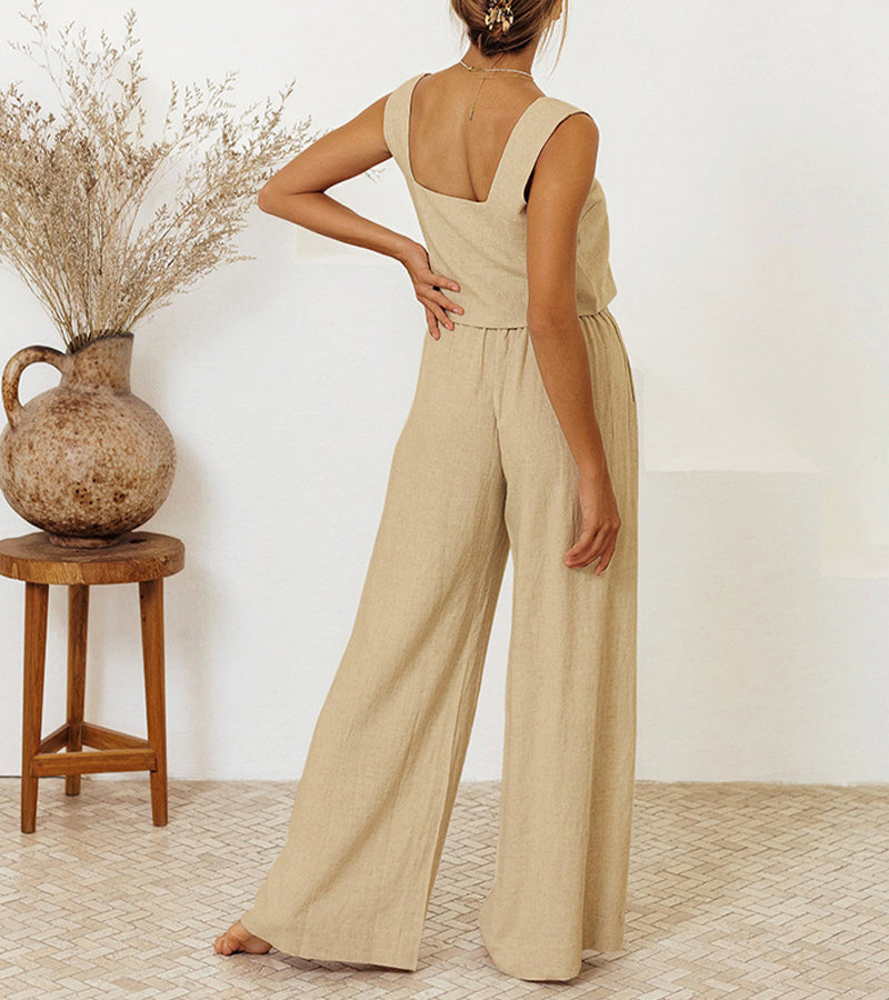 Modern women's fashion pants set with a chic square neck top and flowy wide-leg pants.