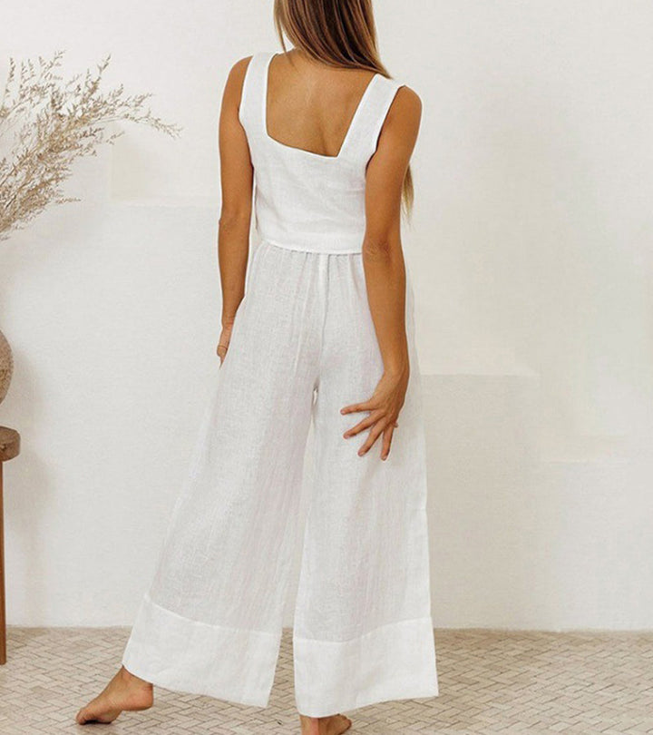 Chic women's minimalist two-piece set; square neck top & wide-leg pants for a modern look.