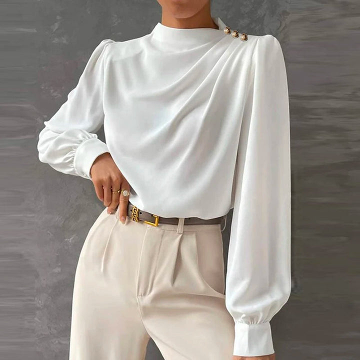 Sophisticated women's long sleeve mock neck blouse, featuring chic ruching & gold buttons for versatile styling.