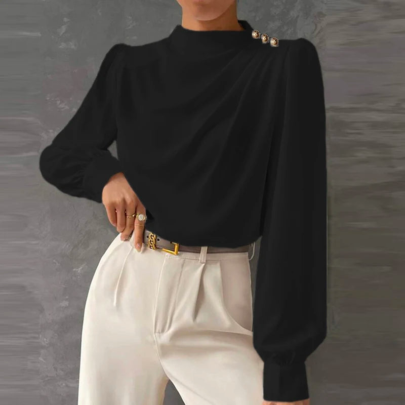 Dressy mock neck blouse for women, showcasing stylish ruched sleeves & prominent gold button details. Business casual.