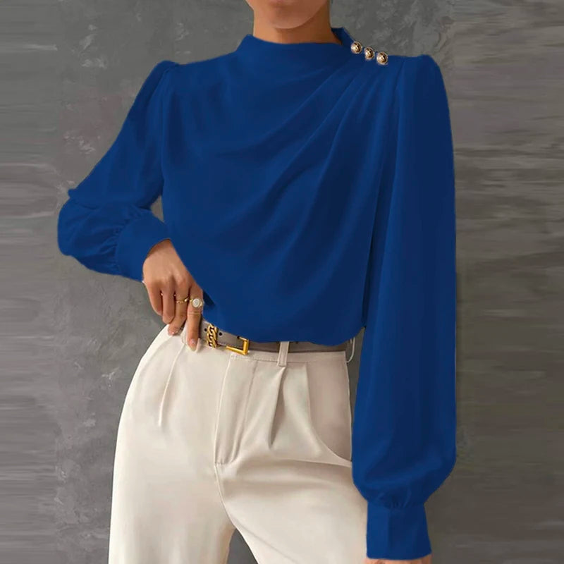 Classic women's mock neck ruched long sleeve top with decorative gold buttons. Ideal for work or evening.