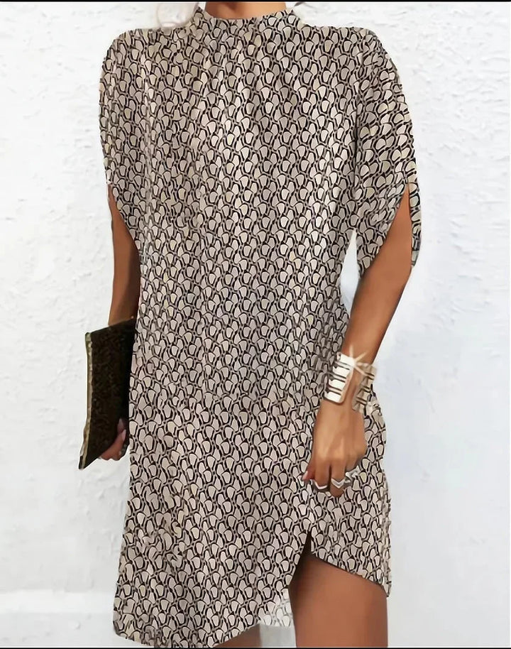 Versatile women's mini dress with mock neck and flowing cape sleeves for effortless casual elegance.