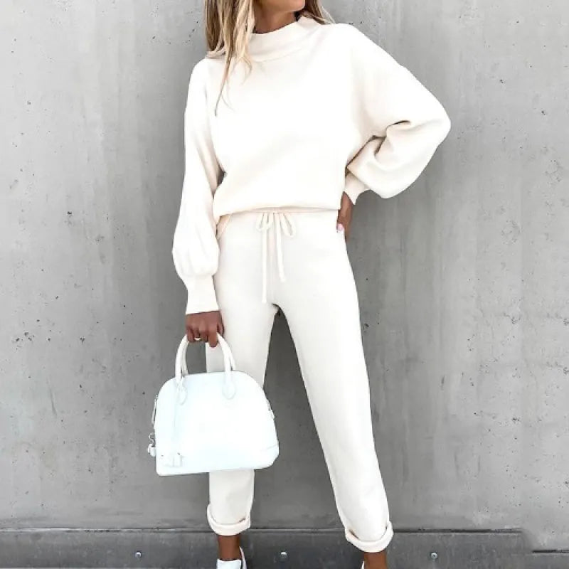 Versatile women's two-piece set: mock neck top & drawstring pants. Perfect for lounging or stylish casual.