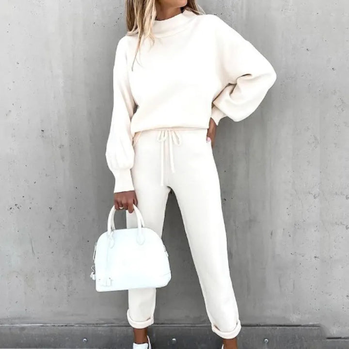 Versatile women's two-piece set: mock neck top & drawstring pants. Perfect for lounging or stylish casual.