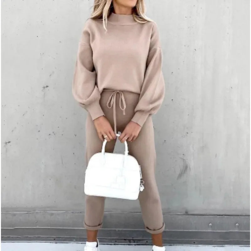 Matching women's two-piece set: mock neck sweater and drawstring pants, comfortable stylish outfit.