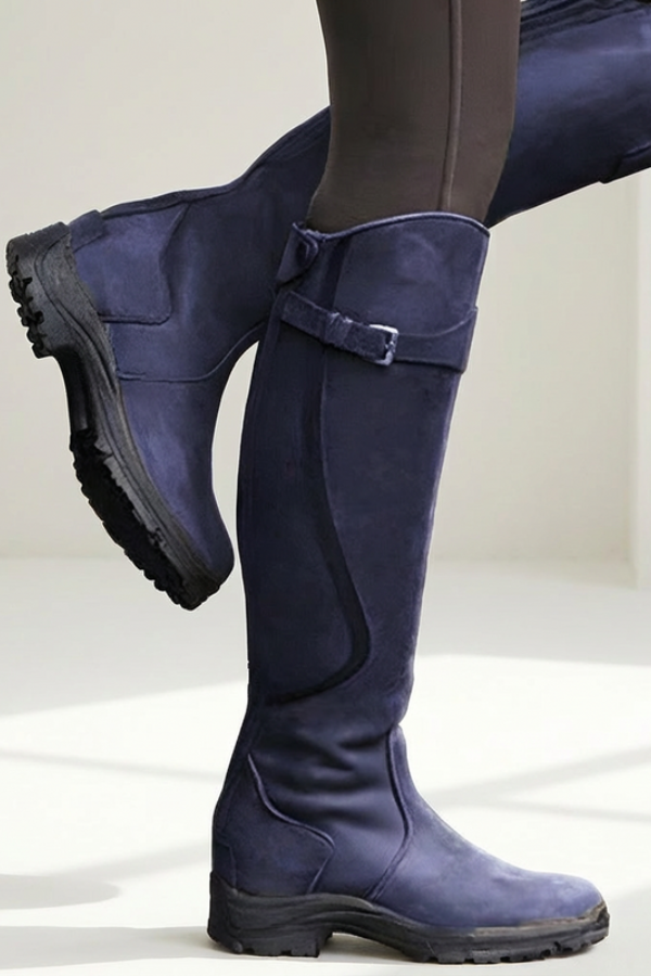 Comfortable calf fit of sleek modern knee-high boots for women, versatile design for fall & winter fashion.