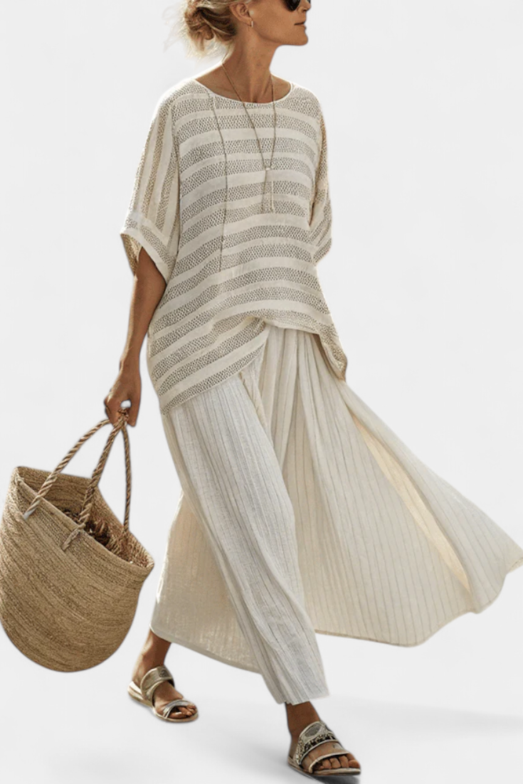 Women's multi-color striped batwing top & flowy maxi skirt set. Perfect casual two-piece for summer beach wear.