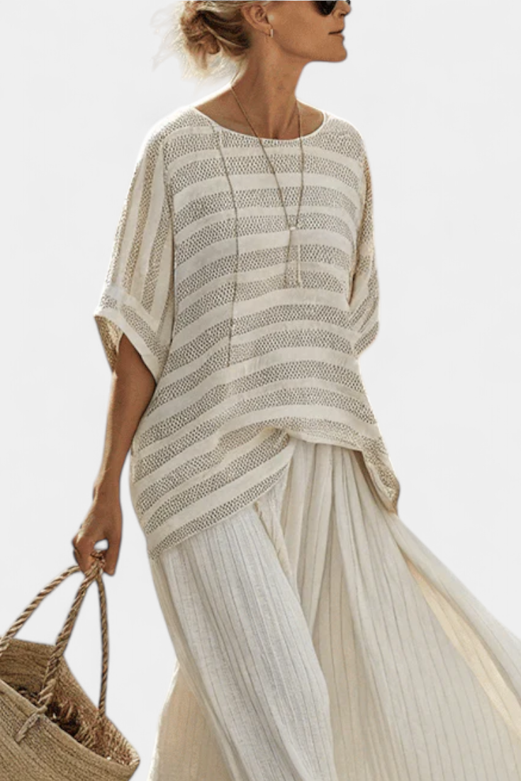 Effortless chic women's striped batwing top and flowy maxi skirt set, ideal for vacation, resort, or coastal style.