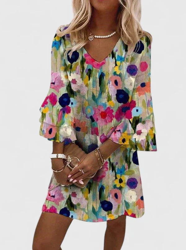 Women's multicolor floral v-neck mini dress with ruffled sleeves, perfect for summer casual wear.