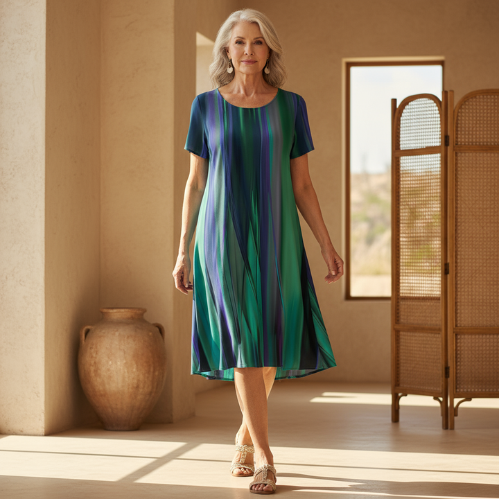 Women's multicolored striped swing dress with a relaxed fit & short sleeves, perfect for casual summer style.