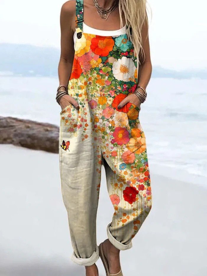 Women's multicolour floral wide-leg jumpsuit. Sleeveless, stylish, ideal for summer casual wear or vacation.