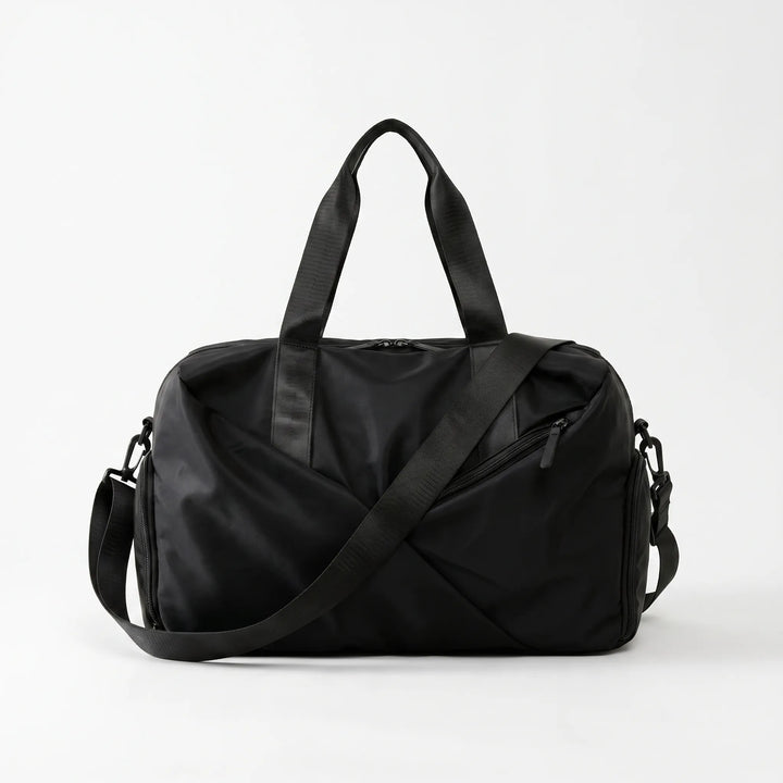 Stylish waterproof women's gym bag, ideal for sports, yoga, or a weekend getaway. Organized compartments.