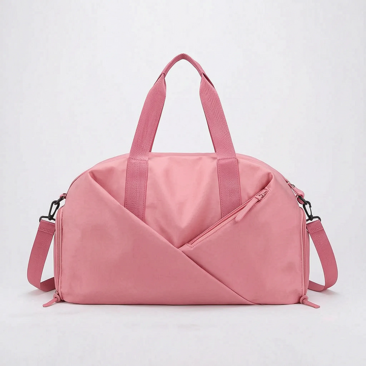 Chic women's sports duffel bag, versatile for gym, travel, or work. Keep essentials organized & dry. Waterproof.
