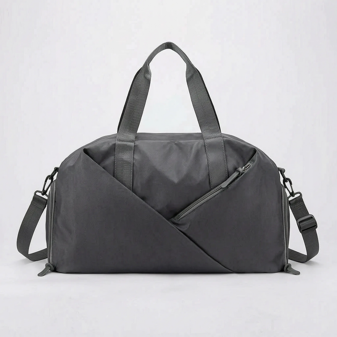 Multifunctional women's duffel bag with wet/dry separation, shoe pouch. Great as a gym bag, workout bag, or travel bag.