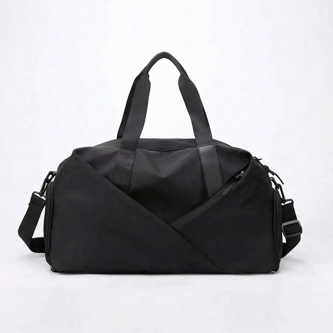 Large women's weekend duffel bag for gym & short trips. Includes separate shoe compartment & waterproof pocket for gear.