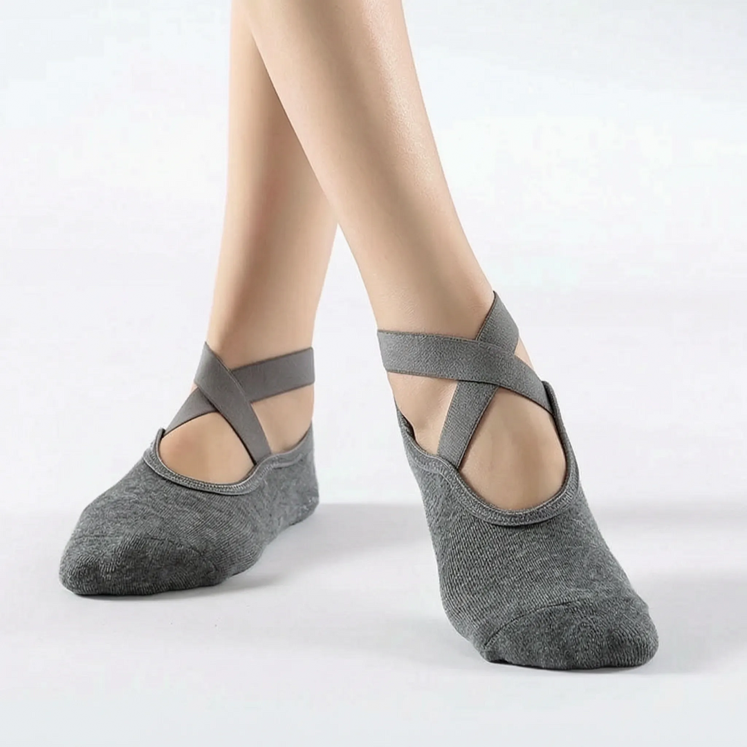 Detailed view of textured non-slip grip on women's yoga socks. Designed for secure traction in studio, pilates, and barre.